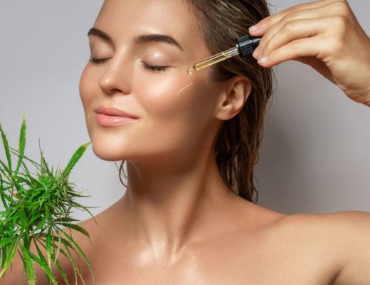 Lady treating her scar with CBD oil