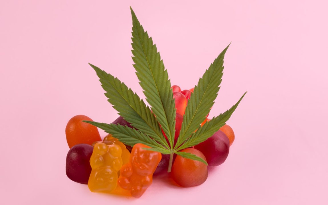 CBD gummies with a cannabis leaf in between them